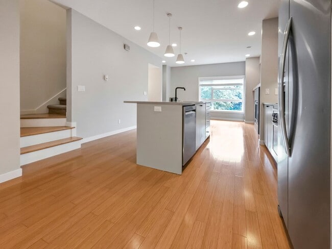 Building Photo - 3-Story Townhouse | 3 Bed, 3.5 Bath | Central Heating | Hardwood Floors | Carpeted Bedrooms | Off...