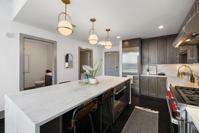 Building Photo - High-Rise Living 1st Month FREE