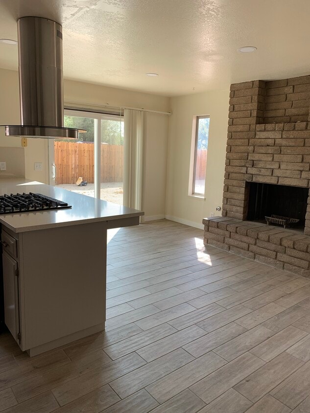 Kitchen looking at fireplace - 325 W Howell Ave