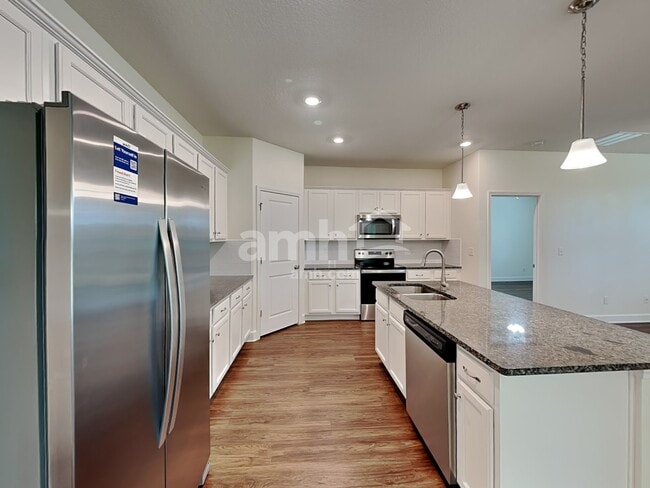 Building Photo - 6607 Hidden Rose Pl