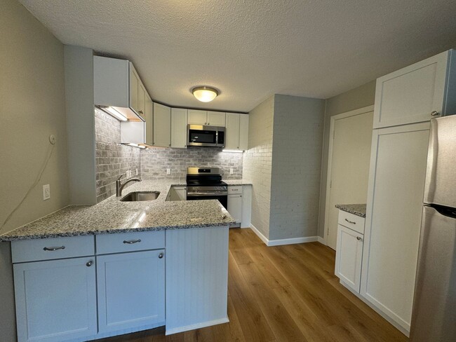 Building Photo - Sunlit Sanctuary: Spacious Two-Bed Apartme...