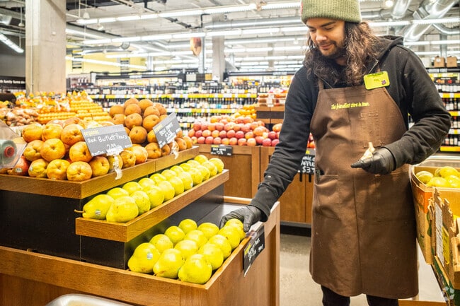 A New Seasons Market grocery store sits across the street from Nicholas Restaurant.