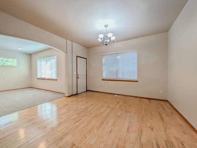 Building Photo - Move in ready 4 bed, 2.5 bath home W/ New Paint & Carpet!