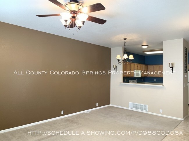 Building Photo - 5946 Ensemble Heights