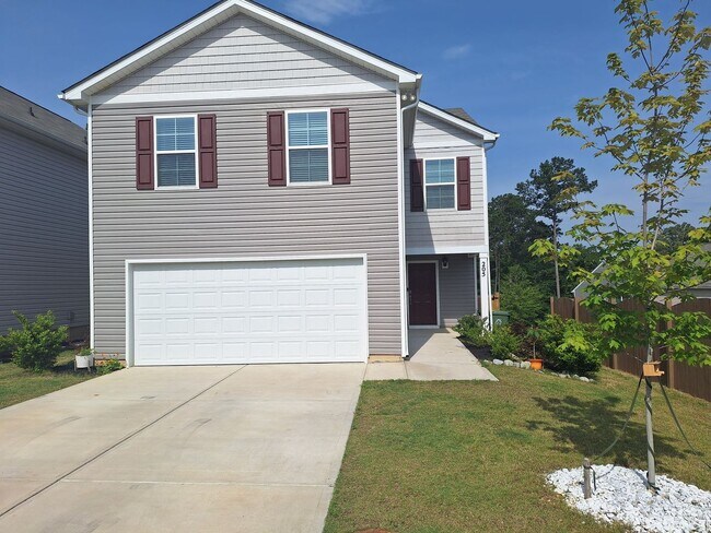 Building Photo - Lovely Four Bedroom Home  Appropriately 5 ...