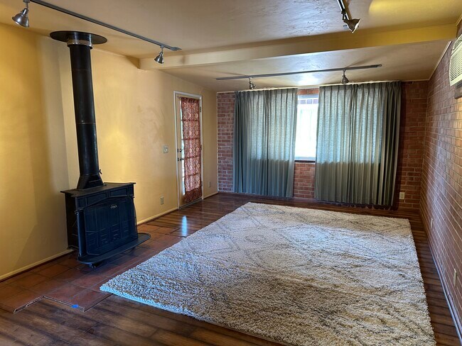 Bedroom 4/Workshop/Office: a double-size room (about 20x13) far from the other three bedrooms with a - 1416 E Lind Rd