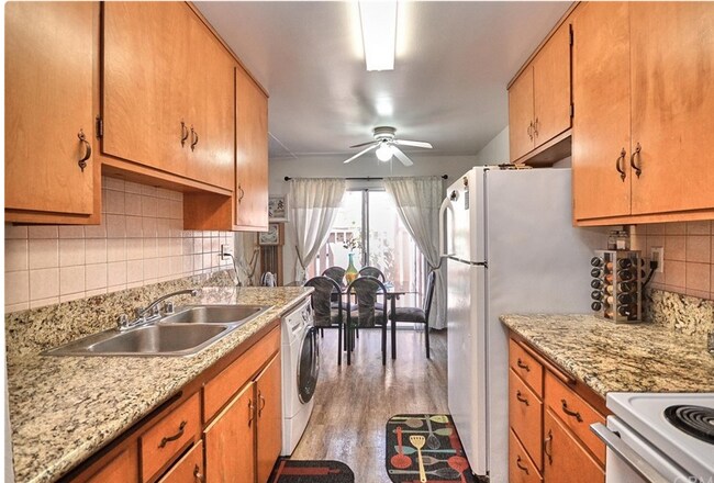 Refrigerator and cabinets - 4727 Jackson St