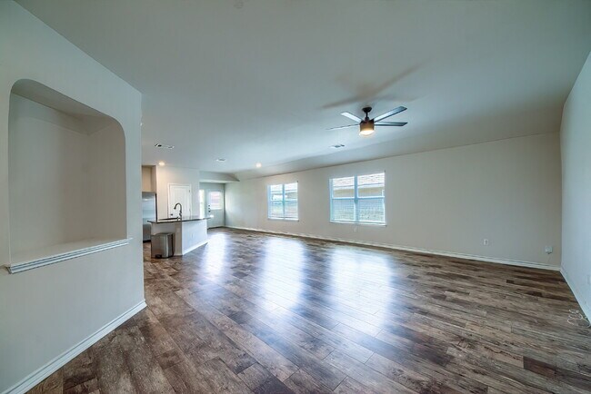 Building Photo - Welcome to this beautifully maintained 4-bedroom, 2-bathroom home in the highly desirable Whisper...