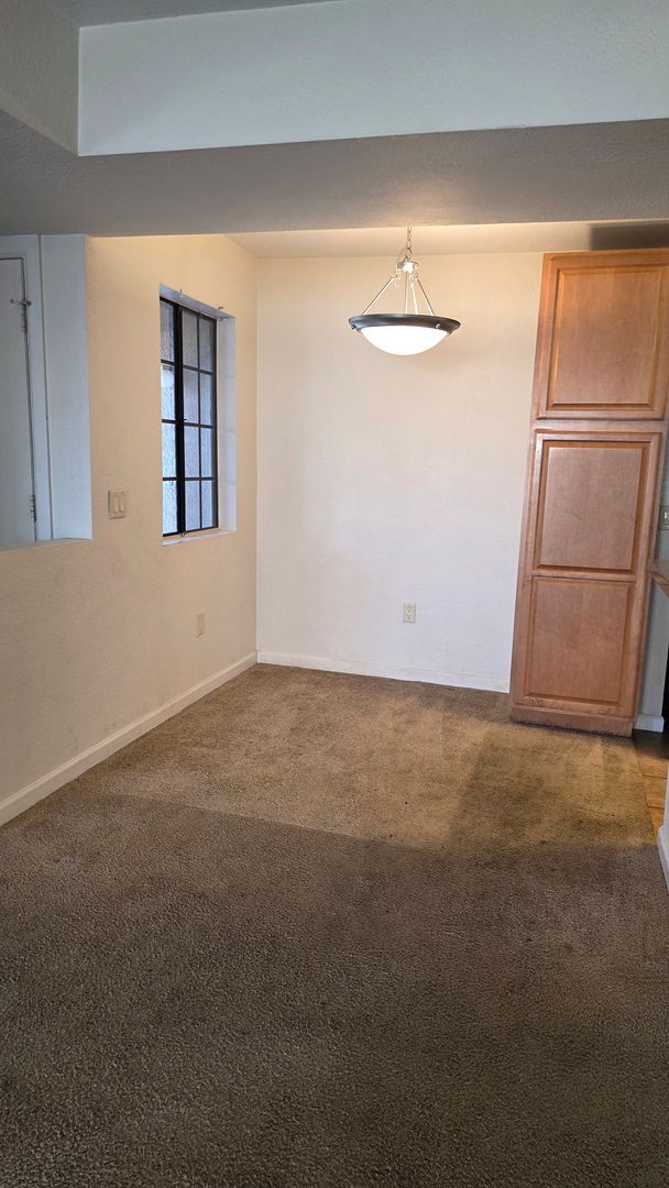 Building Photo - Take in mountain and desert views! First-level, two-bedroom, two-bath corner unit in Moonrise at ...
