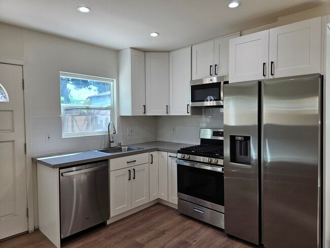 New stainless steel appliances - 2315 S Spaulding Ave
