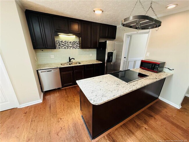 Foto del edificio - 6927 Wickersham Rd