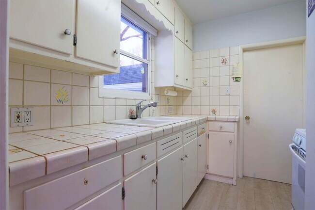 Enjoy the great kitchen offering ample counter! - 2409 S Lafayette St