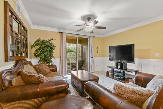 furnished living room - 6450 Emerald Dunes Dr