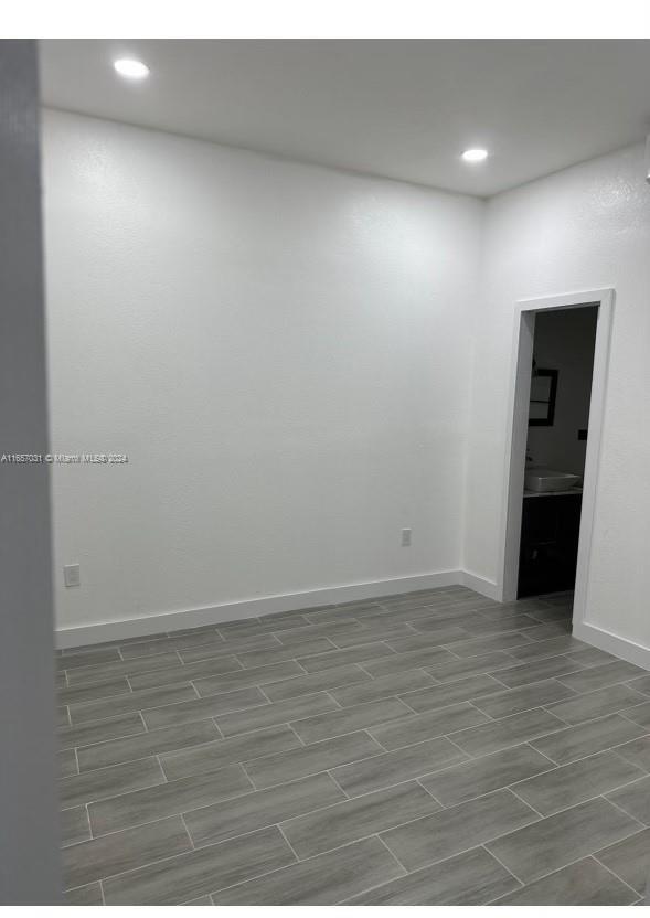 Building Photo - 3719 NE 10th Ct