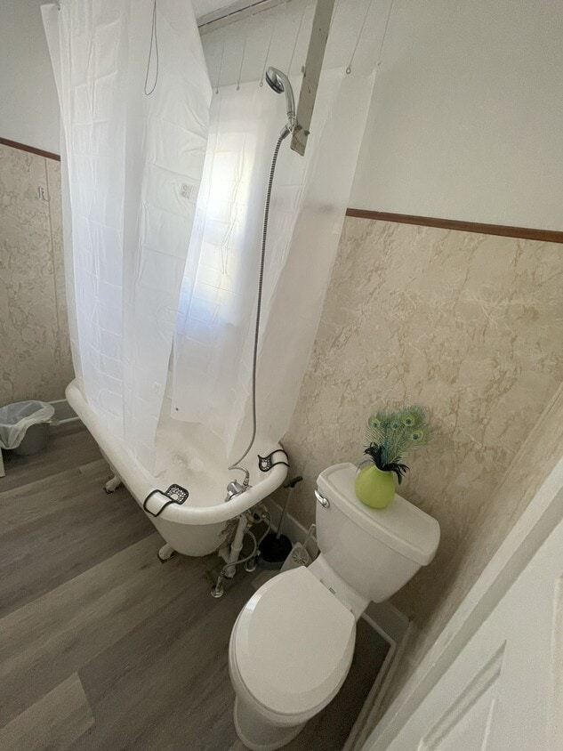 Old fashion claw foot tub with shower adaptation - 906 1/2 S Mulberry St