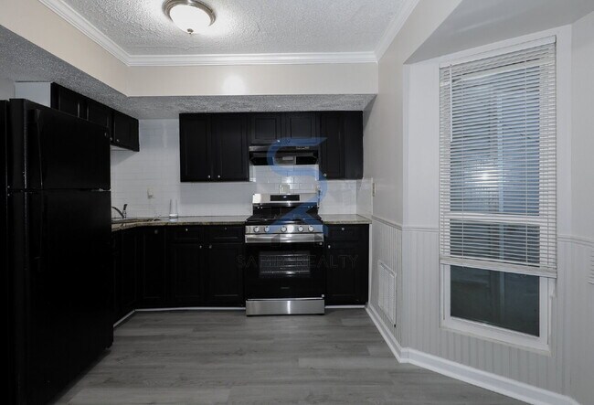 Foto del edificio - Move in before November 30th and choose your reward: a $250 Amazon Gift Card or a 55" Smart TV!