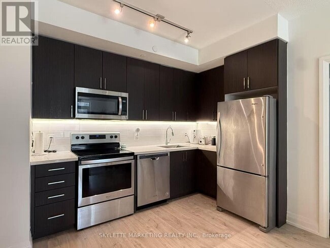 Photo du bâtiment - 591-591 Sheppard Ave E