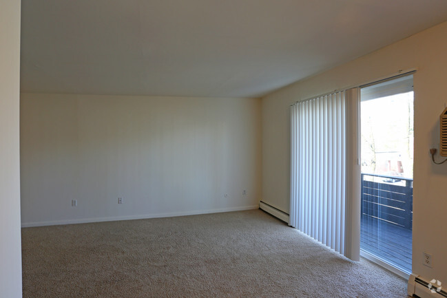 Living Room & Balcony - Oak Forest Apartments