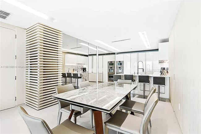 Building Photo - 10201 Collins Ave