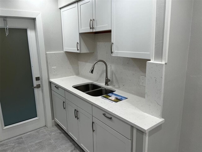 Building Photo - 1605 Pass a Grille Way