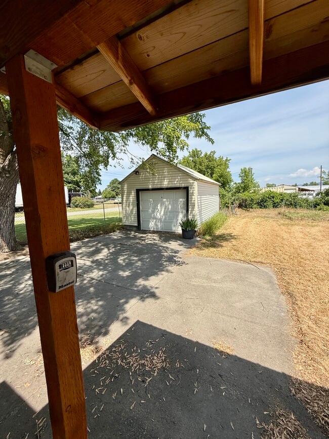 Garage with Chicken Coop behind - 14119 E 8th Ave