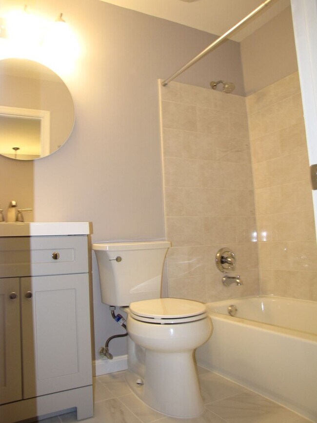 Building Photo - Beautifully updated brick end-unit townhou...