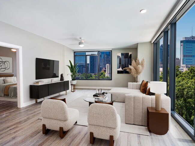 Elija casas con ventanas de piso a techo que muestren vistas del centro de Nashville, mejorando cada momento en Modera McGavock con luz natural y elegancia moderna. - Modera McGavock