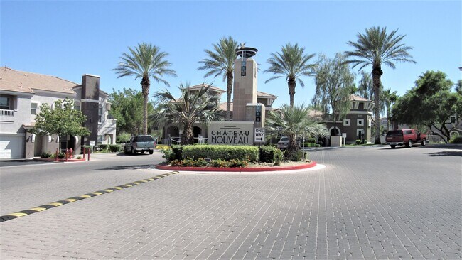 Building Photo - Two bedroom two bathroom ground floor condo in gated Chateau Nouveau with no carpeting!