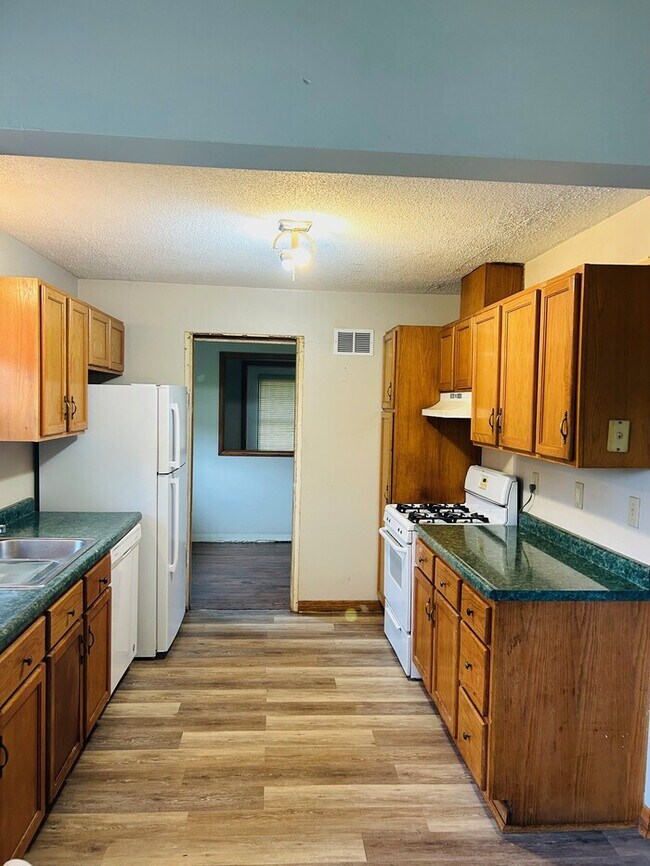 Foto del edificio - 5857 N Colfax Ave