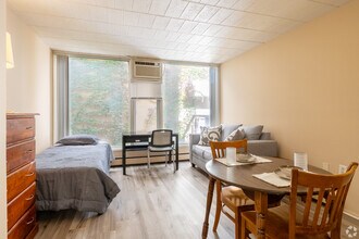 Building Photo - 307 Thompson - Furnished Studios