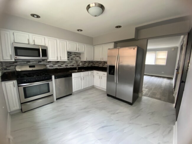 Foto del edificio - 4149 N Tripp Ave