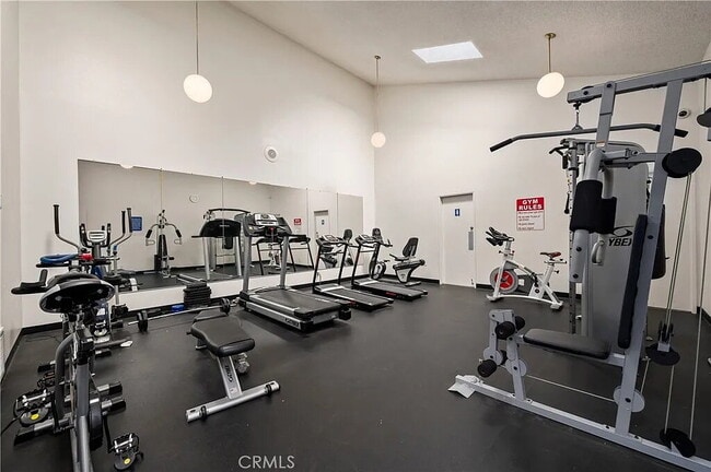 Building Photo - "Chic 1-Bed Retreat with Pool & Central Vacuum in Anaheim's Heart – 710 Sq Ft of Hardwood Elegance!"