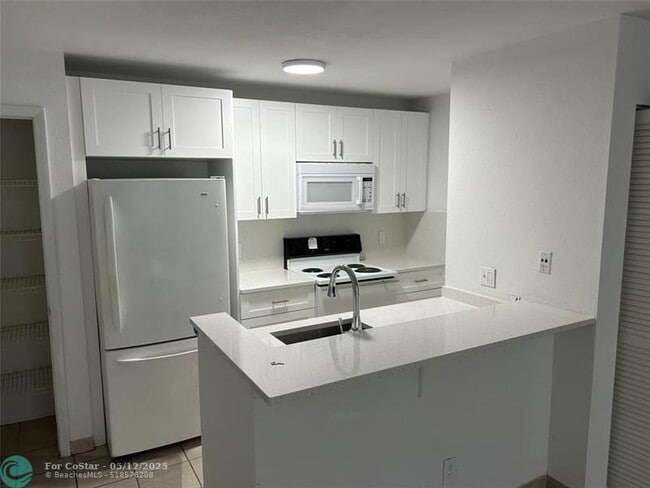 Building Photo - 1705 Palm Cove Blvd