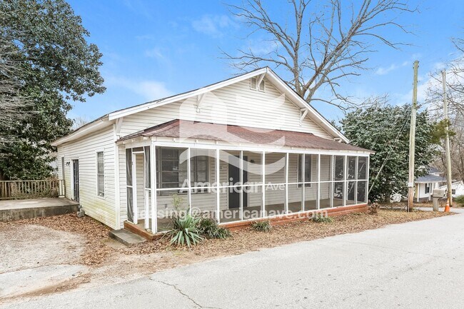 Building Photo - 605 W 7th Ave