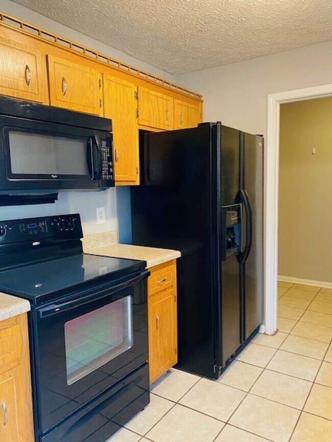 Building Photo - Available Now