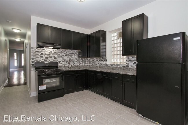 Building Photo - 4 br, 1 bath Apartment - 7836 S. Peoria St.