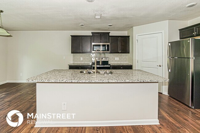 Foto del edificio - 9407 Cornflower Ln