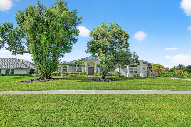 Foto del edificio - 15830 Meadow Wood Dr