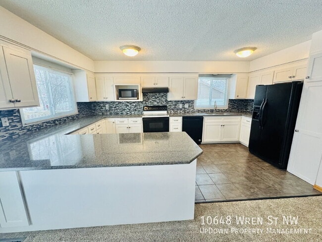 Building Photo - 10648 Wren St NW