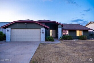 Building Photo - 10944 E Becker Ln