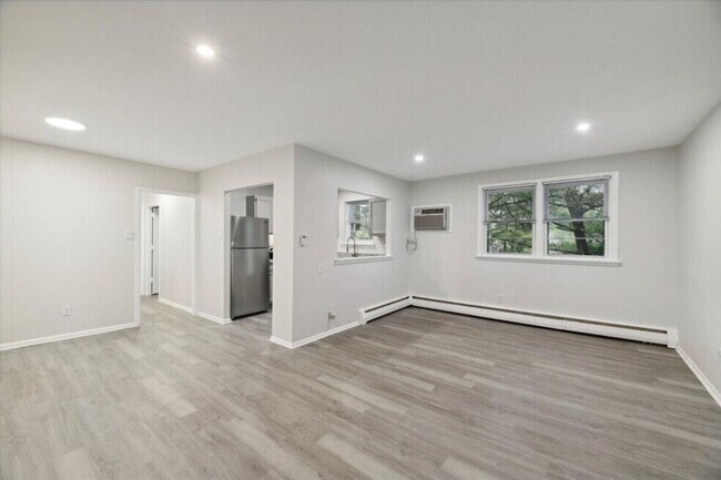 Sala de estar - Apartments At Pine Brook