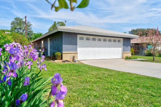 Building Photo - 8311 Raintree Ave