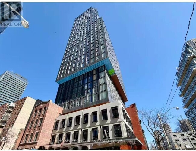 Building Photo - 100 Queen St E