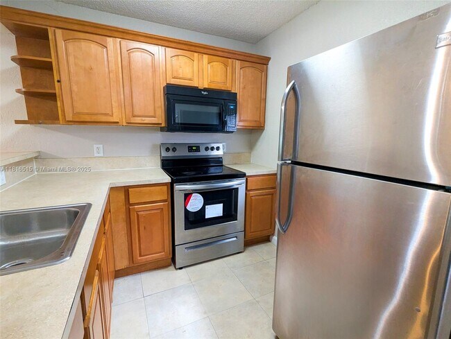Building Photo - 8540 N Sherman Cir