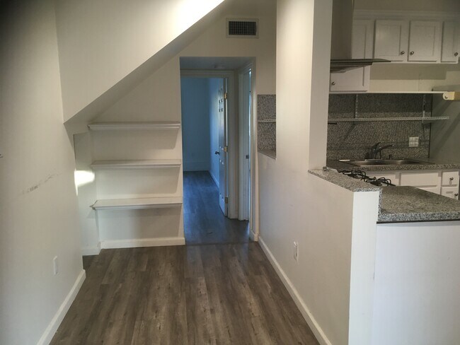 Built in shelves, hallway to bedrooms - 6057 Wilkinson Ave