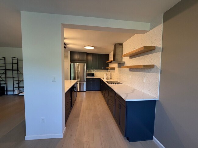 Foto del edificio - Newly Remodeled 1 bedroom / 1.5 bath Condo at Place One