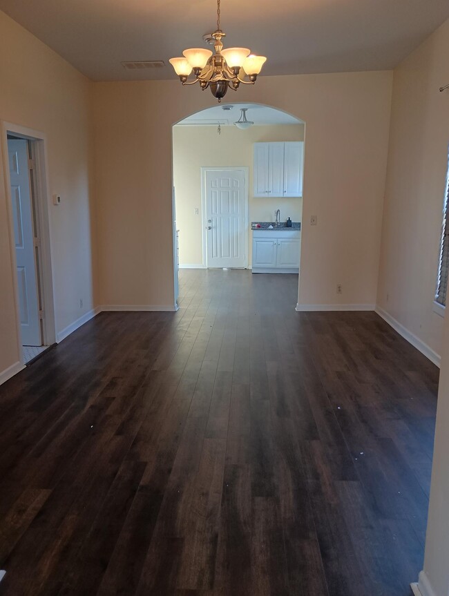 large dining room with bamboo floors - 326 E Calendar Ave