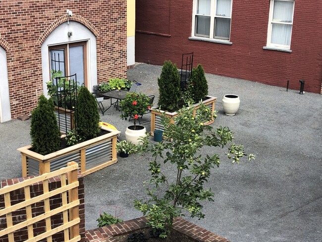 Courtyard - Barney Square & W.L. Stockade Apartments