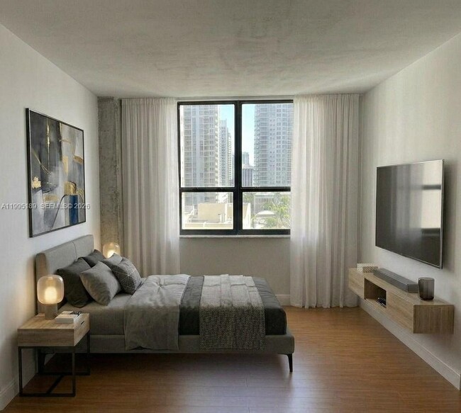Building Photo - 10185 Collins Ave