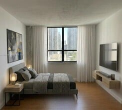 Building Photo - 10185 Collins Ave